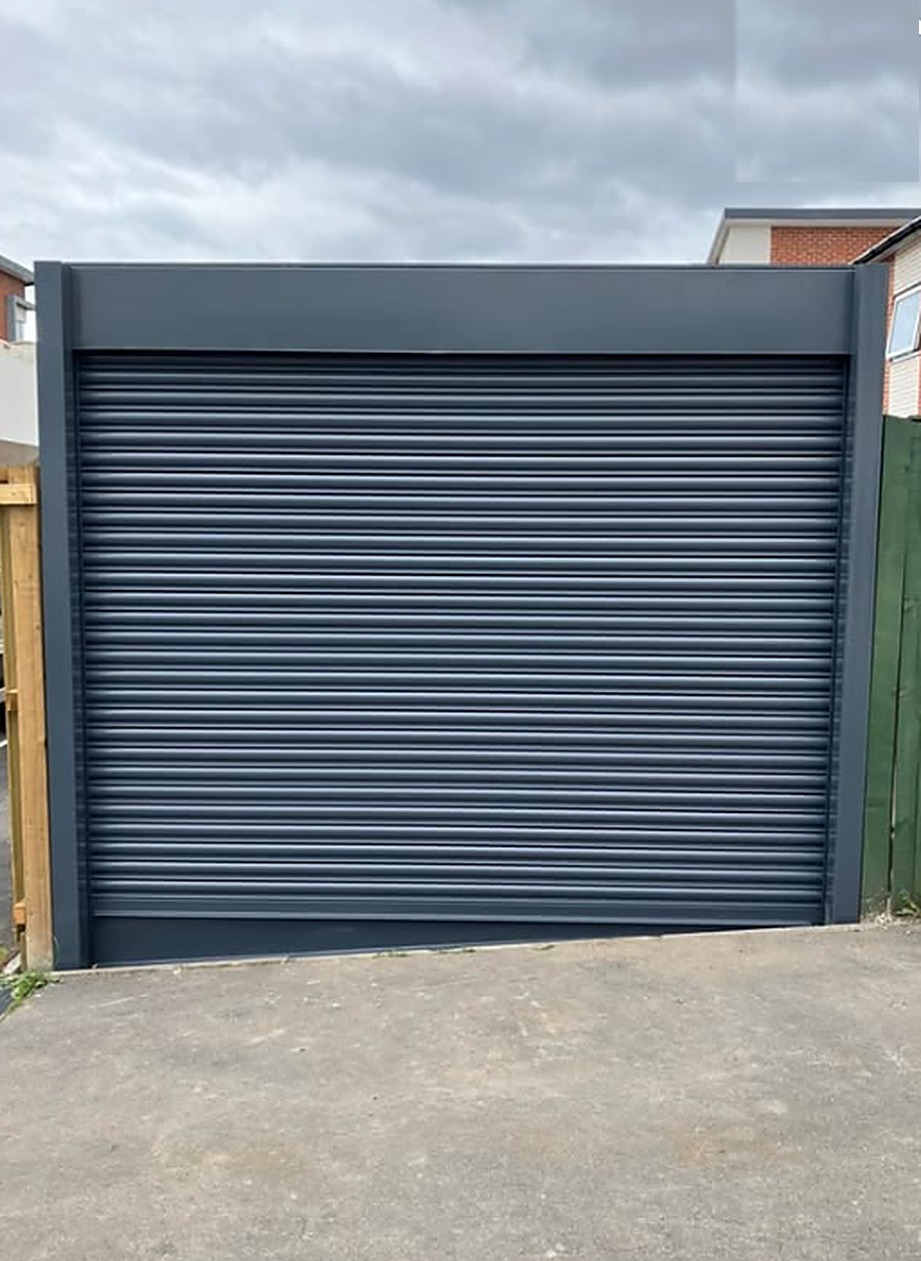 Large anthracite grey industrial roller shutter installed by Wilks